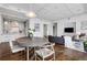 Open concept living space features dining area, modern decor, and open concept kitchen at 1065 Peachtree Ne St # 3003, Atlanta, GA 30309