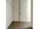 Walk-in closet with hardwood floors, wire shelving and white door at 2029 Memorial Dr # 34, Atlanta, GA 30317