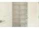Walk-in pantry with door open and wire shelves at 2029 Memorial Dr # 34, Atlanta, GA 30317