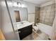 Bathroom features a tub, tile flooring, and a vanity with a mirror at 3650 Lindsy Brooke Ct, Douglasville, GA 30135