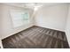 Clean bedroom with plush carpet, window with blinds, and ample natural light at 3650 Lindsy Brooke Ct, Douglasville, GA 30135