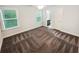 This bedroom features clean carpet, bright windows, and an attached bathroom at 3650 Lindsy Brooke Ct, Douglasville, GA 30135