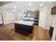 Modern kitchen with large island, granite counters, stainless appliances, and ample cabinet space at 3650 Lindsy Brooke Ct, Douglasville, GA 30135