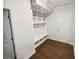 Mud room with storage cubbies, bench, hooks, and hardwood style floors at 3650 Lindsy Brooke Ct, Douglasville, GA 30135