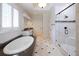 Elegant bathroom with soaking tub, glass shower, and stylish tile flooring at 858 Middle Fork Trl, Suwanee, GA 30024