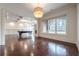 Spacious basement recreation room with pool table and hardwood floors at 3133 Saint Ives Country Club Pkwy, Johns Creek, GA 30097