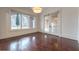 Bright basement room with hardwood floors and access to a patio at 3133 Saint Ives Country Club Pkwy, Johns Creek, GA 30097