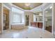 Large bathroom with soaking tub, shower, and double vanity at 3133 Saint Ives Country Club Pkwy, Johns Creek, GA 30097