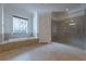 Bathroom with soaking tub, shower, and tile flooring at 3133 Saint Ives Country Club Pkwy, Johns Creek, GA 30097