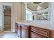 Elegant bathroom with a vanity, large mirror, and a walk-in shower at 3133 Saint Ives Country Club Pkwy, Johns Creek, GA 30097