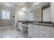 Spacious bathroom with double vanity and granite countertop at 3133 Saint Ives Country Club Pkwy, Johns Creek, GA 30097