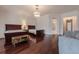 Bedroom with hardwood floors, two beds and a sofa at 3133 Saint Ives Country Club Pkwy, Johns Creek, GA 30097