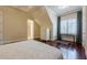 Bright bedroom with hardwood floors and built-in desk area at 3133 Saint Ives Country Club Pkwy, Johns Creek, GA 30097
