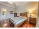 Bedroom with hardwood floors and a built-in desk at 3133 Saint Ives Country Club Pkwy, Johns Creek, GA 30097