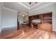 Large bedroom with hardwood floors and views into another bedroom at 3133 Saint Ives Country Club Pkwy, Johns Creek, GA 30097