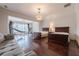 Spacious bedroom with hardwood floors, workout equipment and a hammock at 3133 Saint Ives Country Club Pkwy, Johns Creek, GA 30097