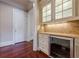Butlers pantry with wine cooler, granite countertops, and ample storage at 3133 Saint Ives Country Club Pkwy, Johns Creek, GA 30097