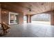 Brick patio with wood ceiling, access to backyard at 3133 Saint Ives Country Club Pkwy, Johns Creek, GA 30097