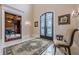Elegant entry with double doors and rug at 3133 Saint Ives Country Club Pkwy, Johns Creek, GA 30097