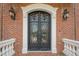 Ornate iron double front doors at 3133 Saint Ives Country Club Pkwy, Johns Creek, GA 30097
