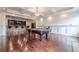 Basement game room with pool table and coffered ceiling at 3133 Saint Ives Country Club Pkwy, Johns Creek, GA 30097