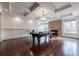 Spacious game room with pool table and coffered ceiling at 3133 Saint Ives Country Club Pkwy, Johns Creek, GA 30097