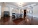 Game room with ping pong table, fireplace, and hardwood floors at 3133 Saint Ives Country Club Pkwy, Johns Creek, GA 30097