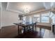 Game room with ping pong table, hardwood floors, and large windows at 3133 Saint Ives Country Club Pkwy, Johns Creek, GA 30097
