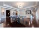 Basement game room with ping pong table and hardwood floors at 3133 Saint Ives Country Club Pkwy, Johns Creek, GA 30097