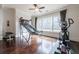 Game room with hardwood floors, basketball game and elliptical at 3133 Saint Ives Country Club Pkwy, Johns Creek, GA 30097
