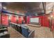 Home theater with large screen, seating, and a starlit ceiling at 3133 Saint Ives Country Club Pkwy, Johns Creek, GA 30097