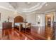 Spacious main bedroom with hardwood floors and ensuite bathroom at 3133 Saint Ives Country Club Pkwy, Johns Creek, GA 30097