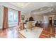 Home office with hardwood floors and large window at 3133 Saint Ives Country Club Pkwy, Johns Creek, GA 30097