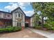 Two story building with balcony and landscaping at 6851 Roswell Rd # E1, Atlanta, GA 30328