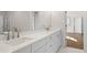 Double vanity bathroom with white cabinets and quartz countertop at 2711 Twisted Oak Ln, Marietta, GA 30066