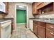 Traditional Kitchen design featuring dark wood cabinetry and modern appliances at 3240 Somerset Se Ct, Conyers, GA 30013