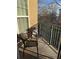 Relaxing balcony featuring chairs and a view of trees, perfect for enjoying the outdoors at 230 E Ponce De Leon Ave # 210, Decatur, GA 30030