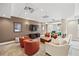 Community room with comfortable seating and a large TV at 230 E Ponce De Leon Ave # 210, Decatur, GA 30030
