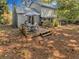 Elevated view of home's backyard, deck and wooded area at 3004 Hidden Lake Dr, Duluth, GA 30096