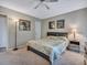 Serene bedroom with carpeted floors, a king-size bed, and plenty of natural light at 3004 Hidden Lake Dr, Duluth, GA 30096