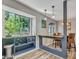 Kitchen features a casual dining area with a built-in bar and views to the backyard at 3004 Hidden Lake Dr, Duluth, GA 30096