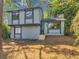 Two-story house with gray siding and a light brown door at 3004 Hidden Lake Dr, Duluth, GA 30096