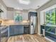 Updated kitchen featuring stainless steel appliances and ample counter space at 3004 Hidden Lake Dr, Duluth, GA 30096