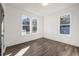 Spacious bedroom featuring hardwood floors and ample natural light at 1088 Wedgewood Nw Dr, Atlanta, GA 30318