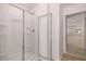 Clean bathroom with a shower stall and access to another room at 4107 Spencer Trl, Stonecrest, GA 30038