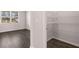 Walk-in closet with wire shelving in bedroom at 4107 Spencer Trl, Stonecrest, GA 30038