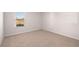 Simple bedroom with carpeted floor at 4107 Spencer Trl, Stonecrest, GA 30038