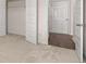 Bedroom with closet and access to hall at 4107 Spencer Trl, Stonecrest, GA 30038