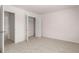 Spacious bedroom with carpeted floor and a large closet at 4107 Spencer Trl, Stonecrest, GA 30038