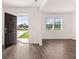 Open entryway with view to backyard and hardwood floors at 4107 Spencer Trl, Stonecrest, GA 30038